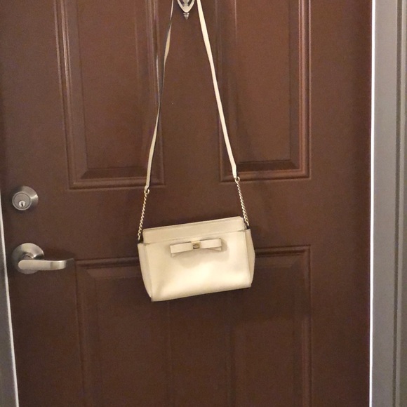 kate spade Handbags - Beige Kate Spade clutch with long strap